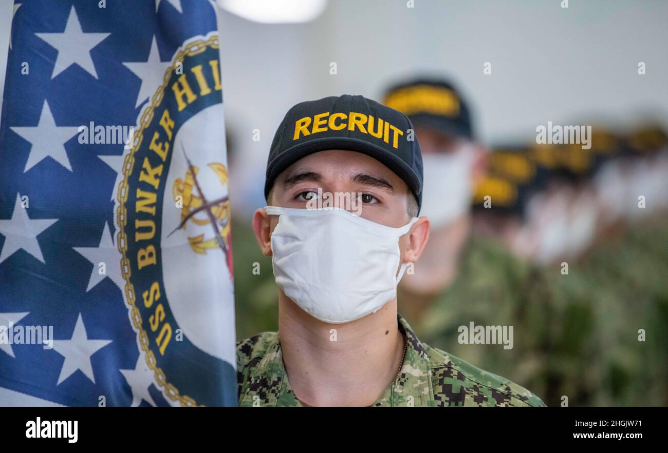 A recruit guideon from division 377, a division sponsored by the ...