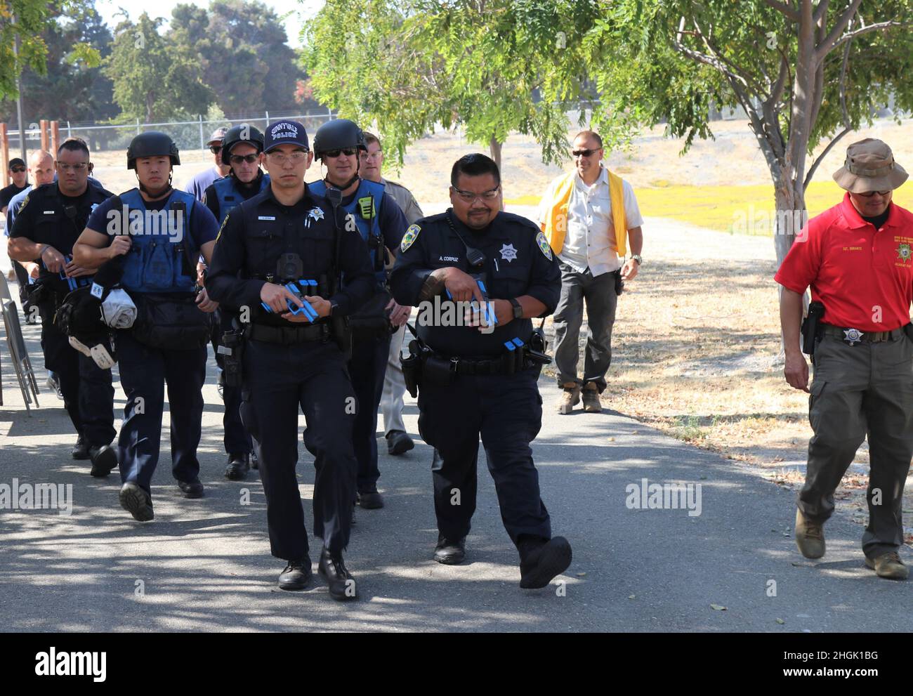 Left to right, Public Safety Officer S. Kotani, Sunnyvale Department of 