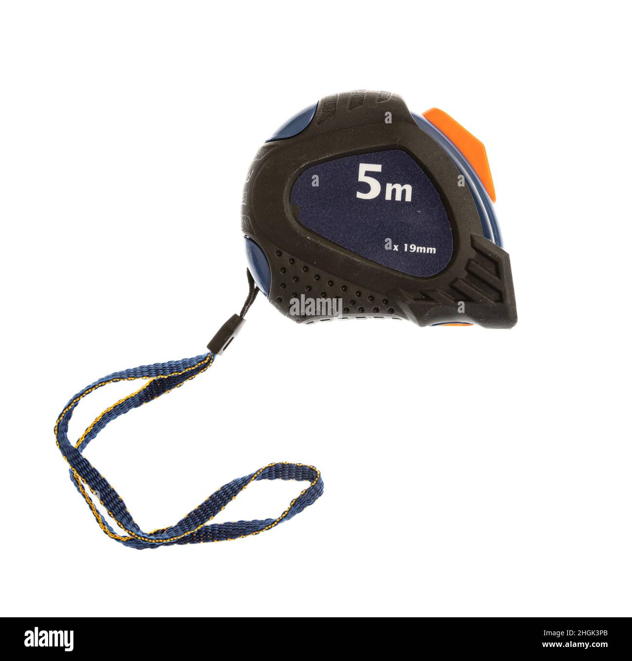 Five meter self retract metal ruler closed, overhead view. Measure tape ...