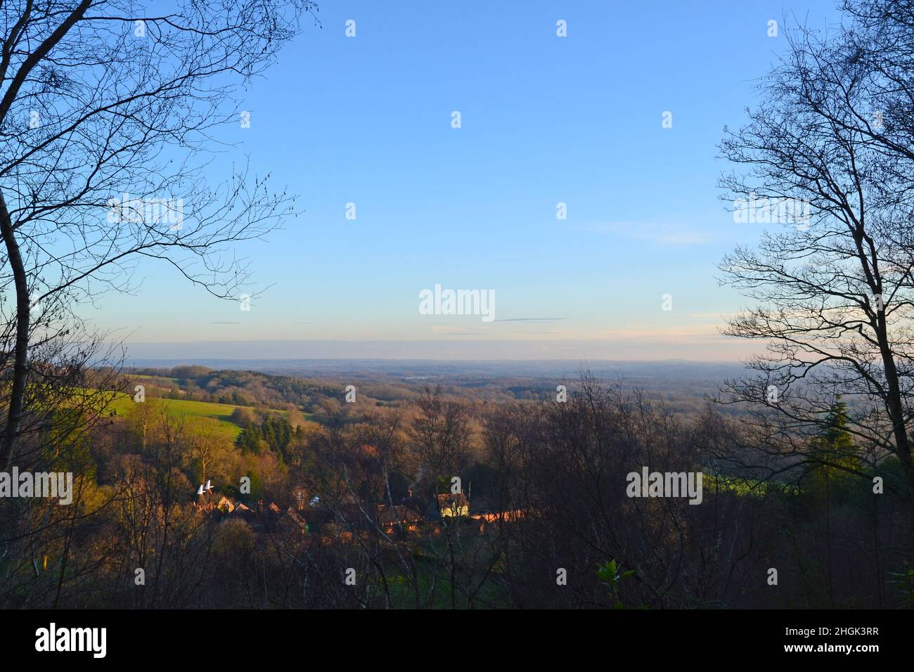 View from Mariners Hill across Chartwell estate to Kent Weald in winter just before sunset, beautiful blue sky and winter atmosphere Stock Photo
