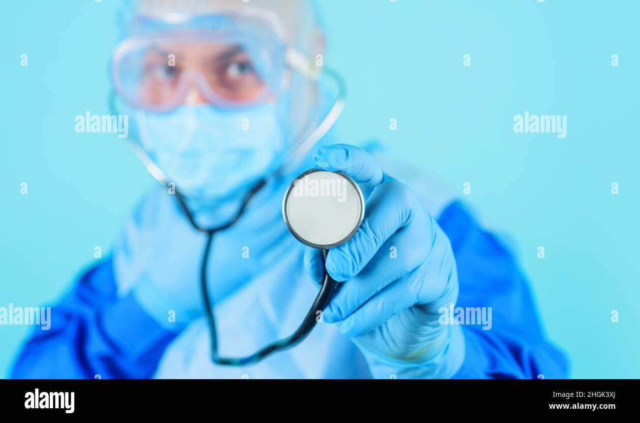 Healthcare and medical check up. Doctor with stethoscope in hand. Advertising hospital, clinic. Selective focus. Stock Photo