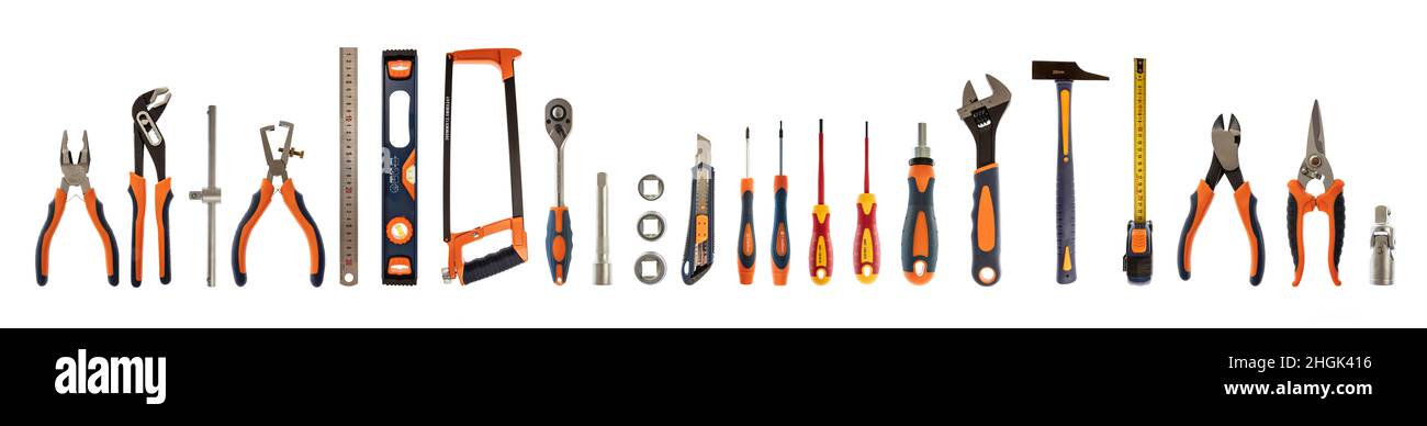 Work tools isolated on white background. Hand tool new set with rubber black and orange handle for repair and construction, banner Stock Photo