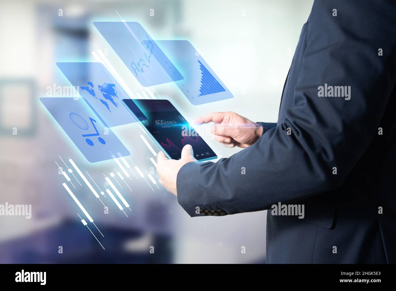 Businessman buying cryptocurrencies in the online market through a tablet. Broker investing in bitcoin, ripple, litecoin... Stock Photo