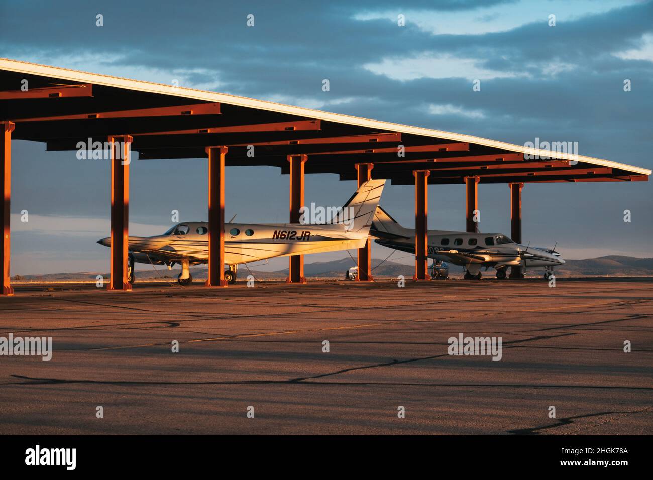a Cessna 340A propeller aircraft parked under shelter at Sierra Blanca