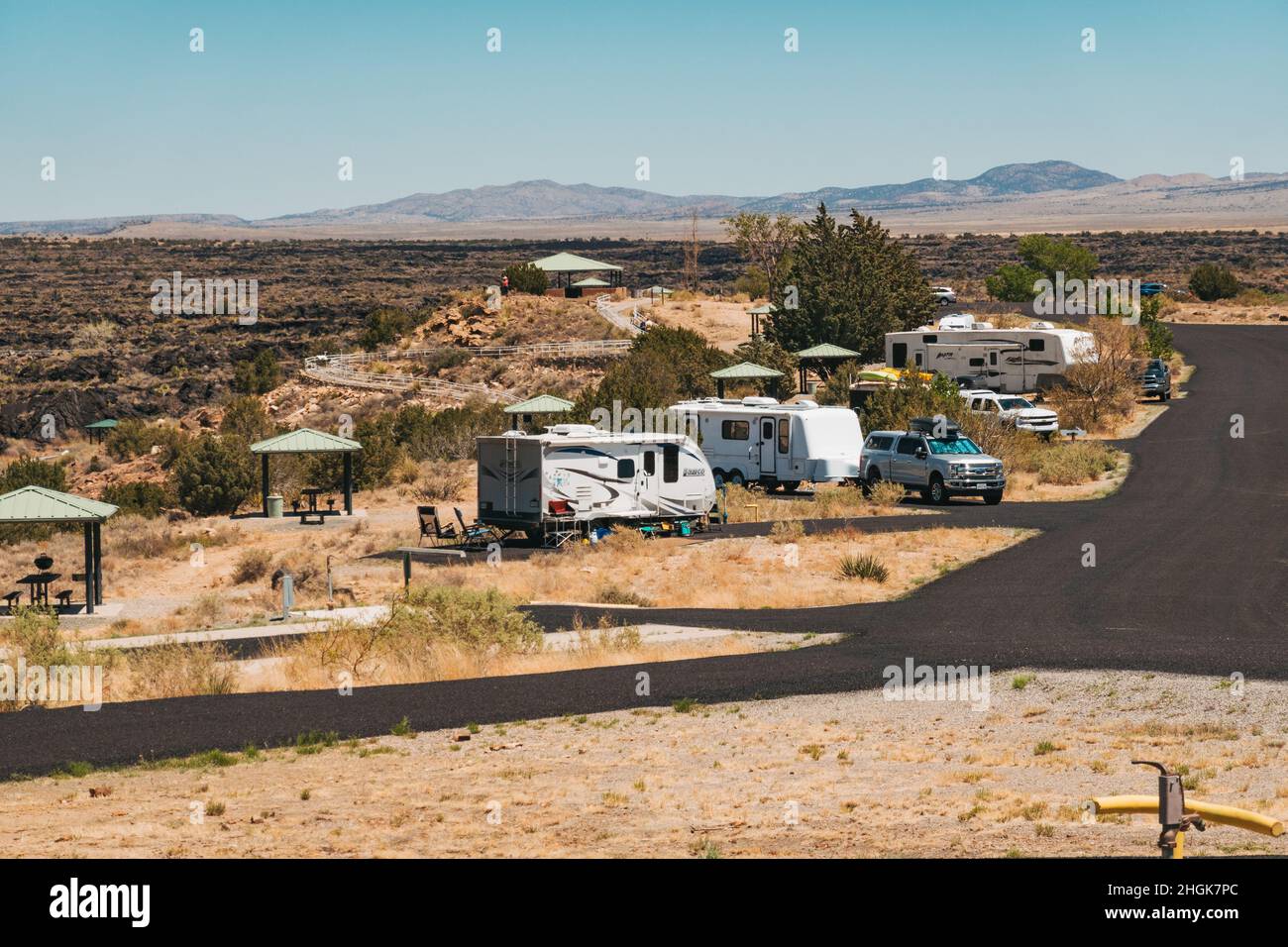 Campervans at the Valley of Fires recreation area next to the Malpais Lava Flow, New Mexico Stock Photo