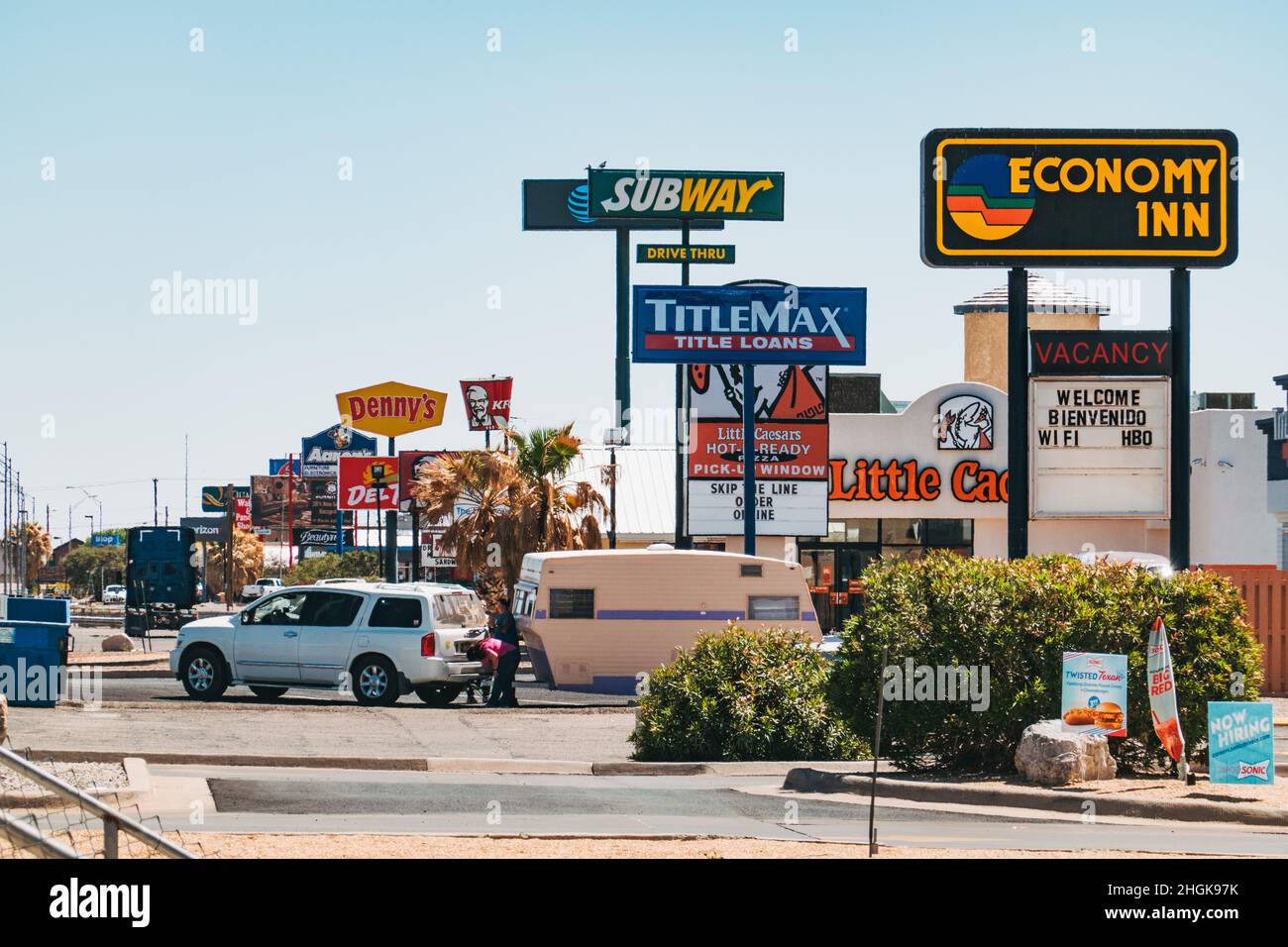 The main street littered with fast food restaurant signage in Alamogordo, New Mexico, United