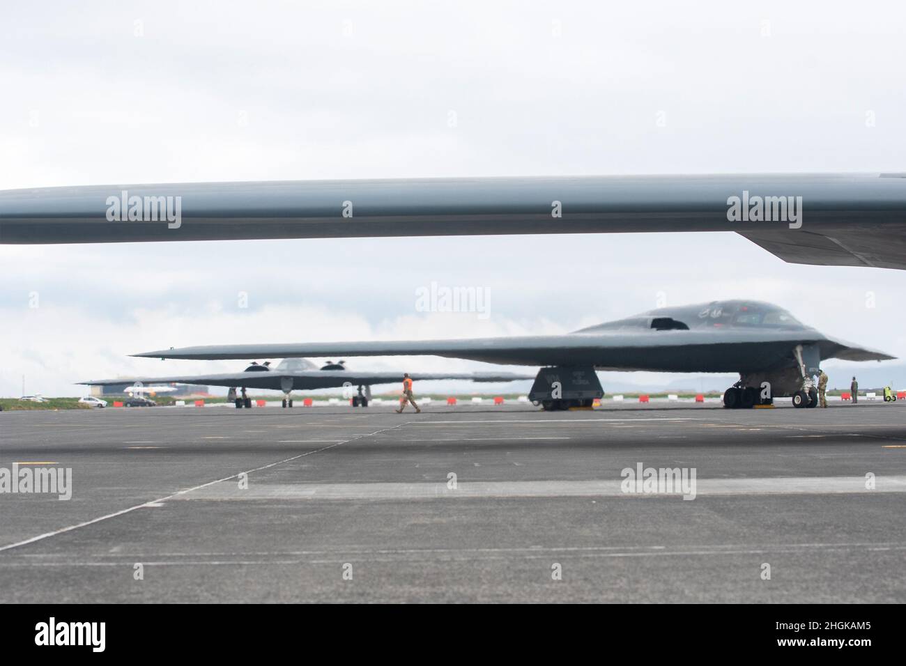Three B-2 Spirit bombers taxi into place on the flight line following a flight Aug. 31, 2021, as part of the stealth bomber’s first Bomber Task Force Europe deployment to Keflavik Air Base, Iceland. Operations out of the Arctic region allows the world’s only stealth bomber fleet to be ready for any mission, anywhere in the world at any time. Stock Photo