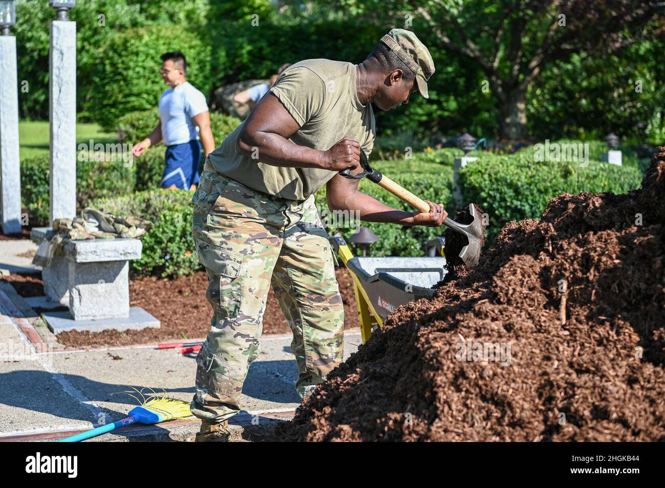 Master Sgt. Samuel Burke, Airman & Family Readiness Center readiness NCO, spreads mulch near the POW/MIA Monument at Hanscom Air Force Base, Mass., Aug. 31. Volunteers helped to spread mulch, pick weeds and clean up the area prior to a 9/11 ceremony on Sept. 10 and a POW/MIA ceremony on Sept. 16. Stock Photo
