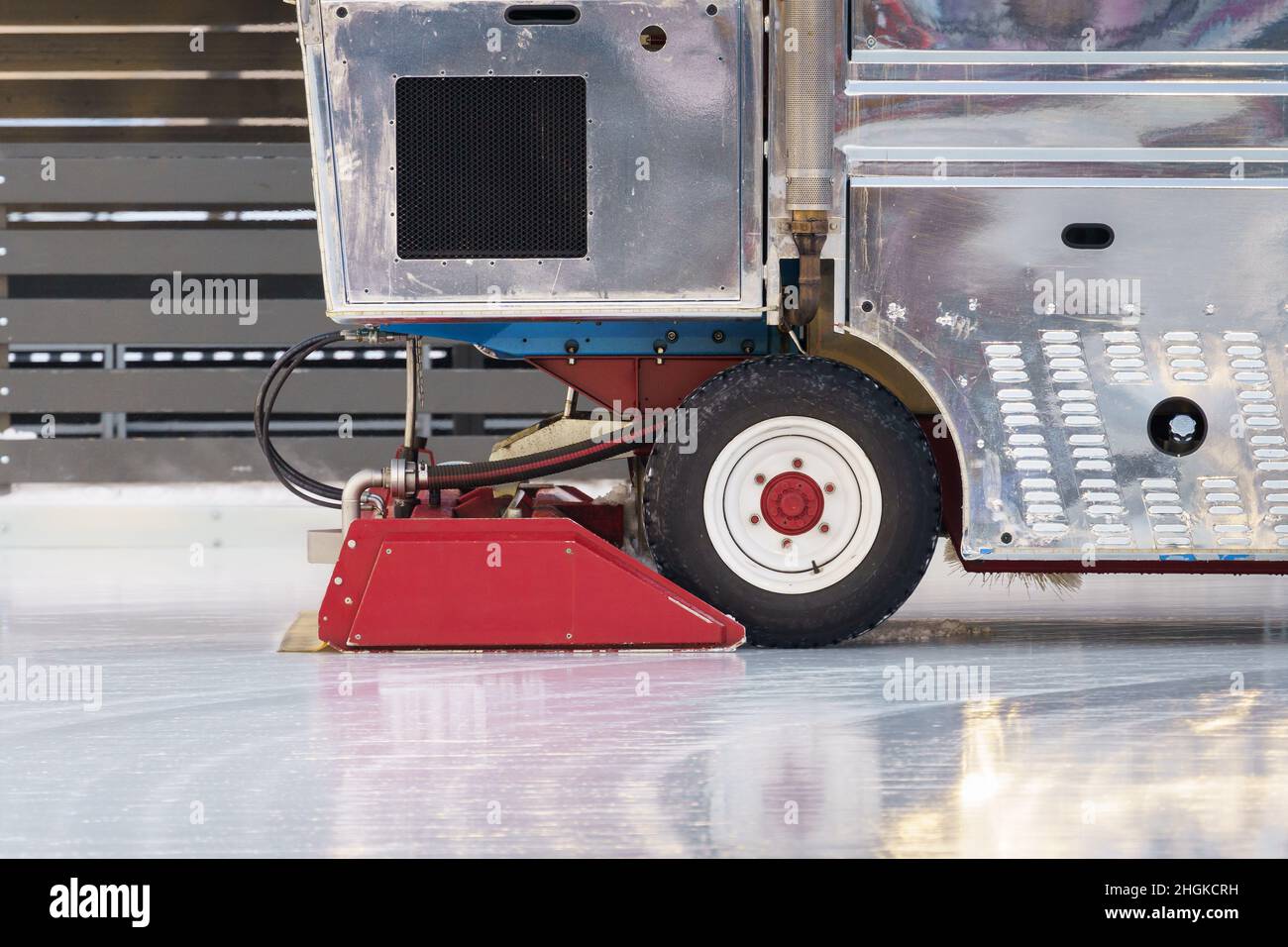 Polished ice maintenance machine ice preparation at rink between