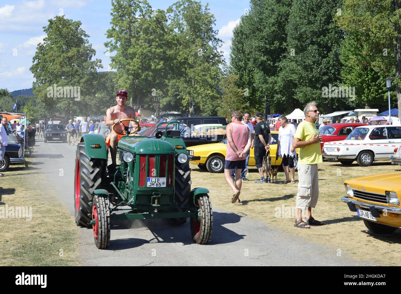 Old vintage green tractor at the oldtimer exhibition Stock Photo - Alamy