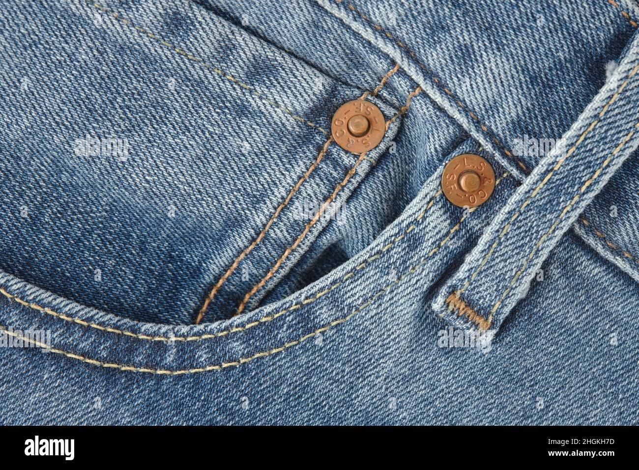 Close up of details of new LEVI'S 501 Jeans. Buttons and seams and pockets close-up. Classic jeans model. LEVI'S is a brand name of Levi Strauss and C Stock Photo