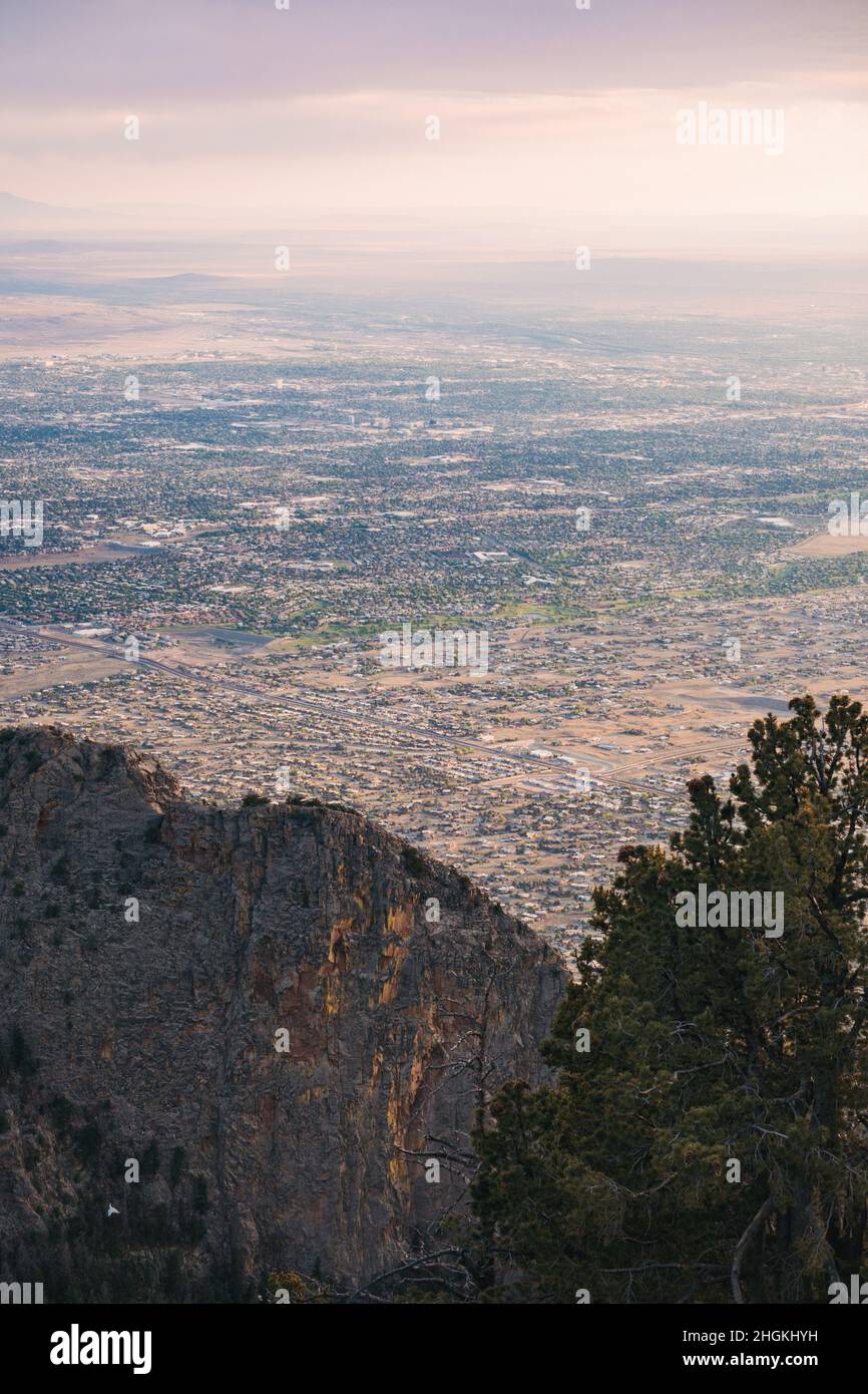 the city of Albuquerque, New Mexico, as seen from the top of the Sandia Mountains at sunset Stock Photo