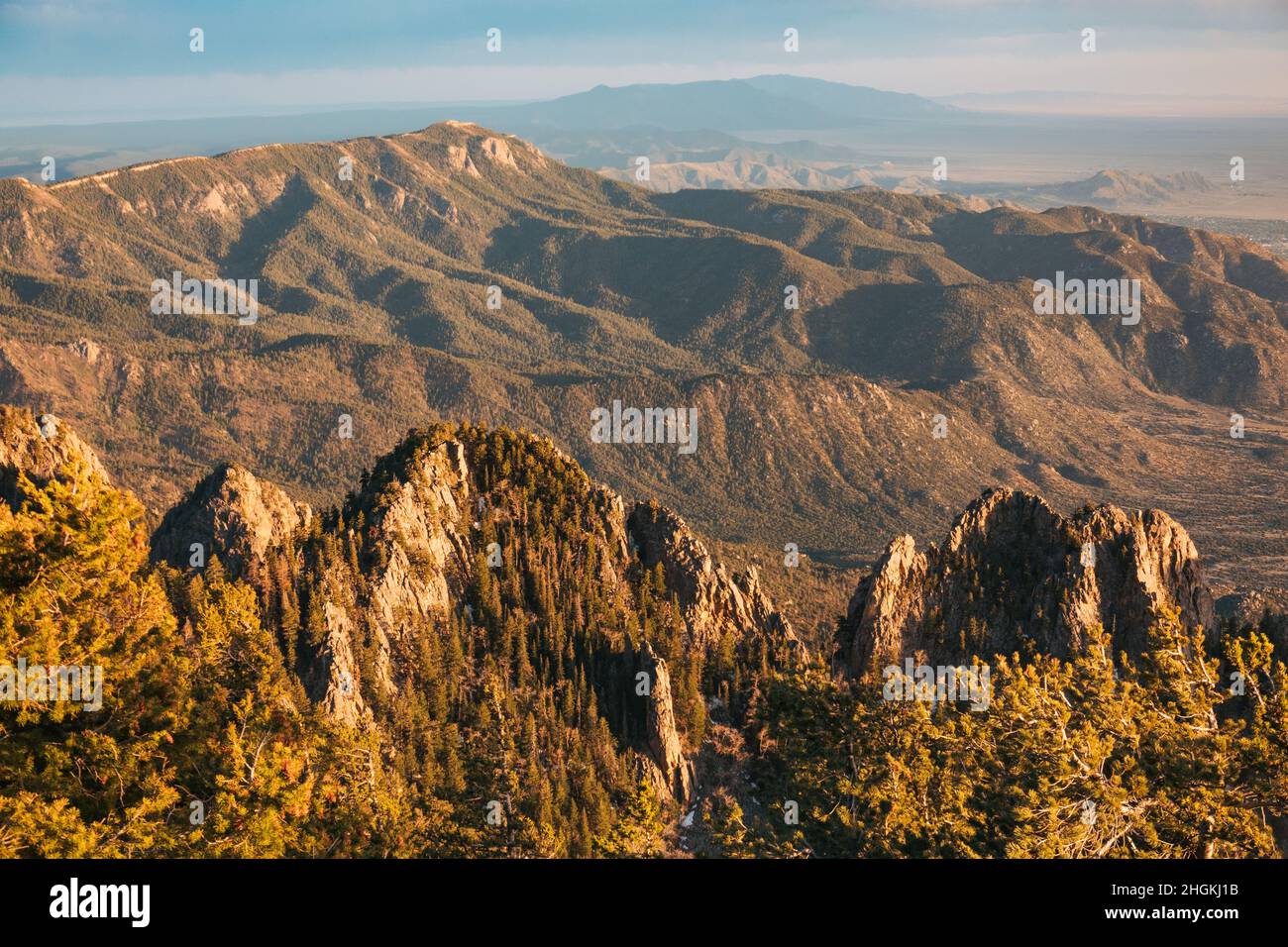 the forest-covered Sandia Mountains at dusk, Albuquerque, New Mexico Stock Photo