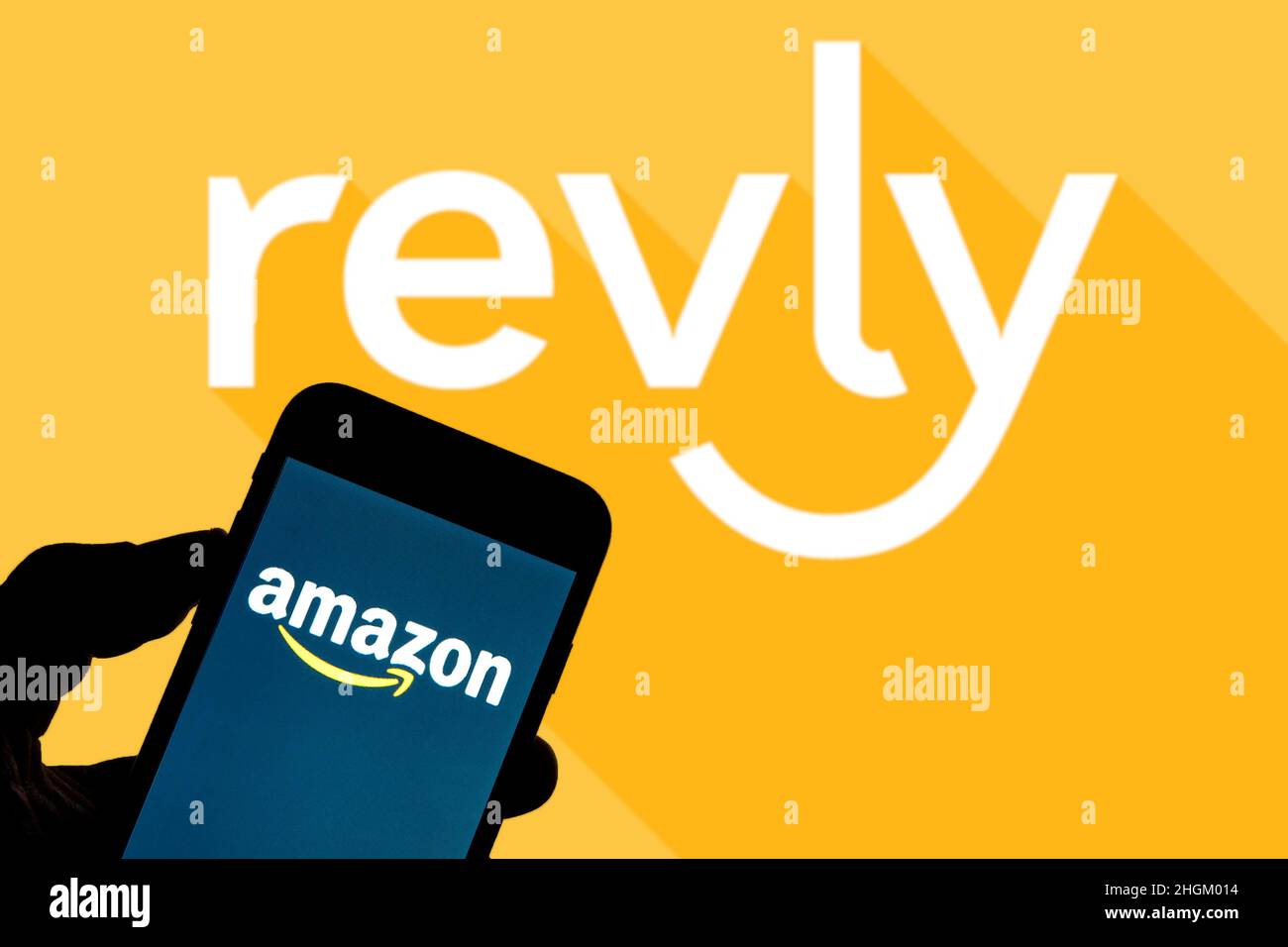 In this photo illustration an Amazon logo seen displayed on a