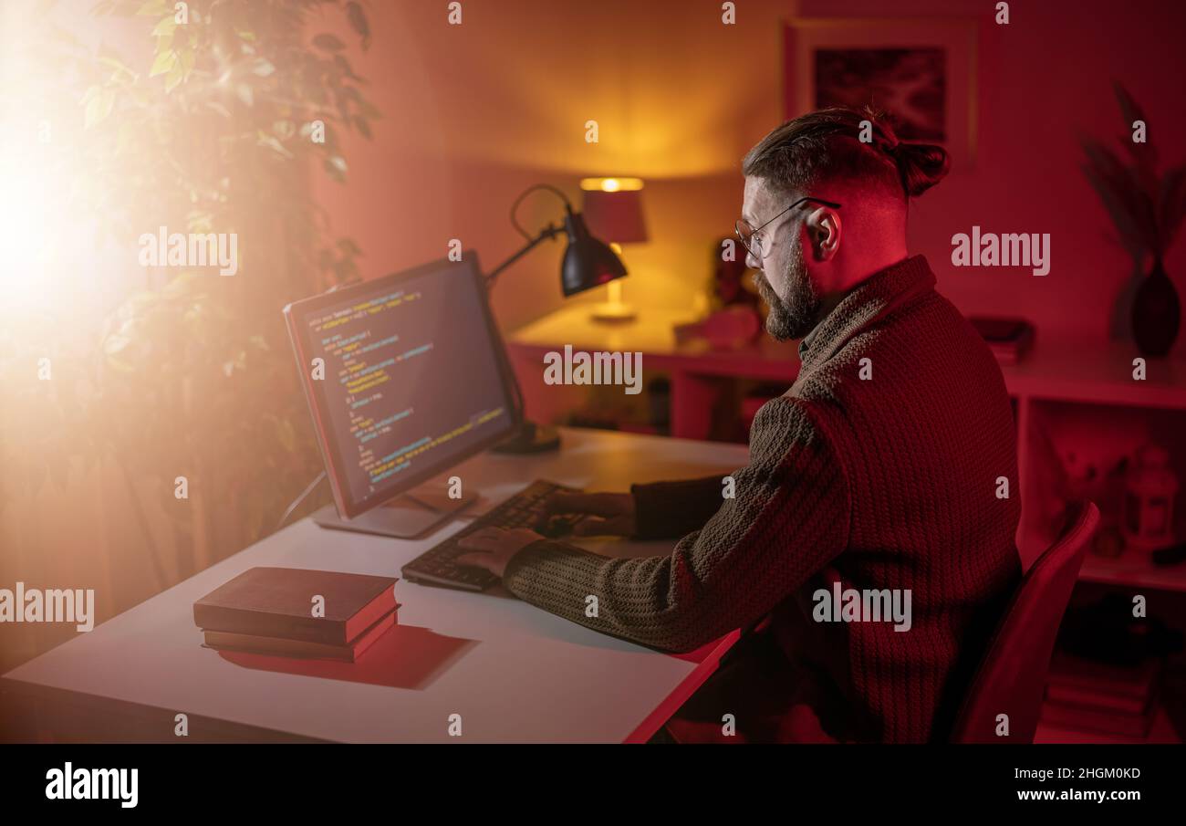 Man programming on pc Stock Photo - Alamy