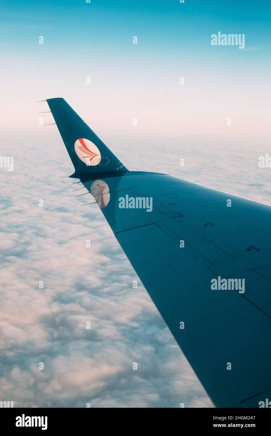 Minsk, Belarus. View from window on the wing of the aircraft with the Belavia logo. Belavia Belarusian Airlines is the national airline of Belarus. Stock Photo