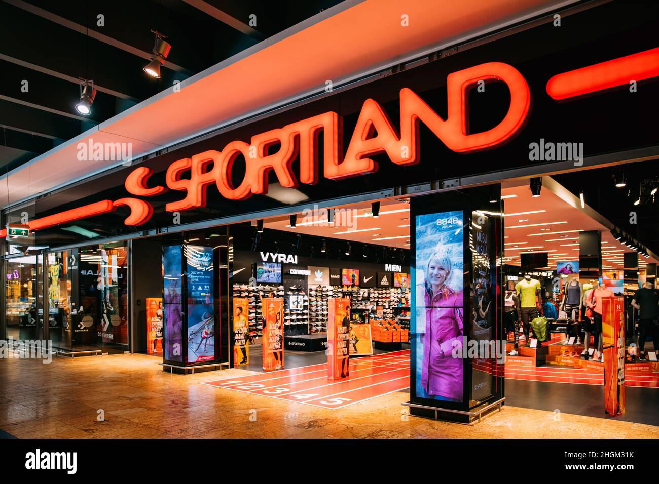 Vilnius, Lithuania. Entrance To Sportswear Store Sportland In Shopping Center. Sportland - Largest Chain Of Sporting Goods And Athletic Leisure In Stock Photo