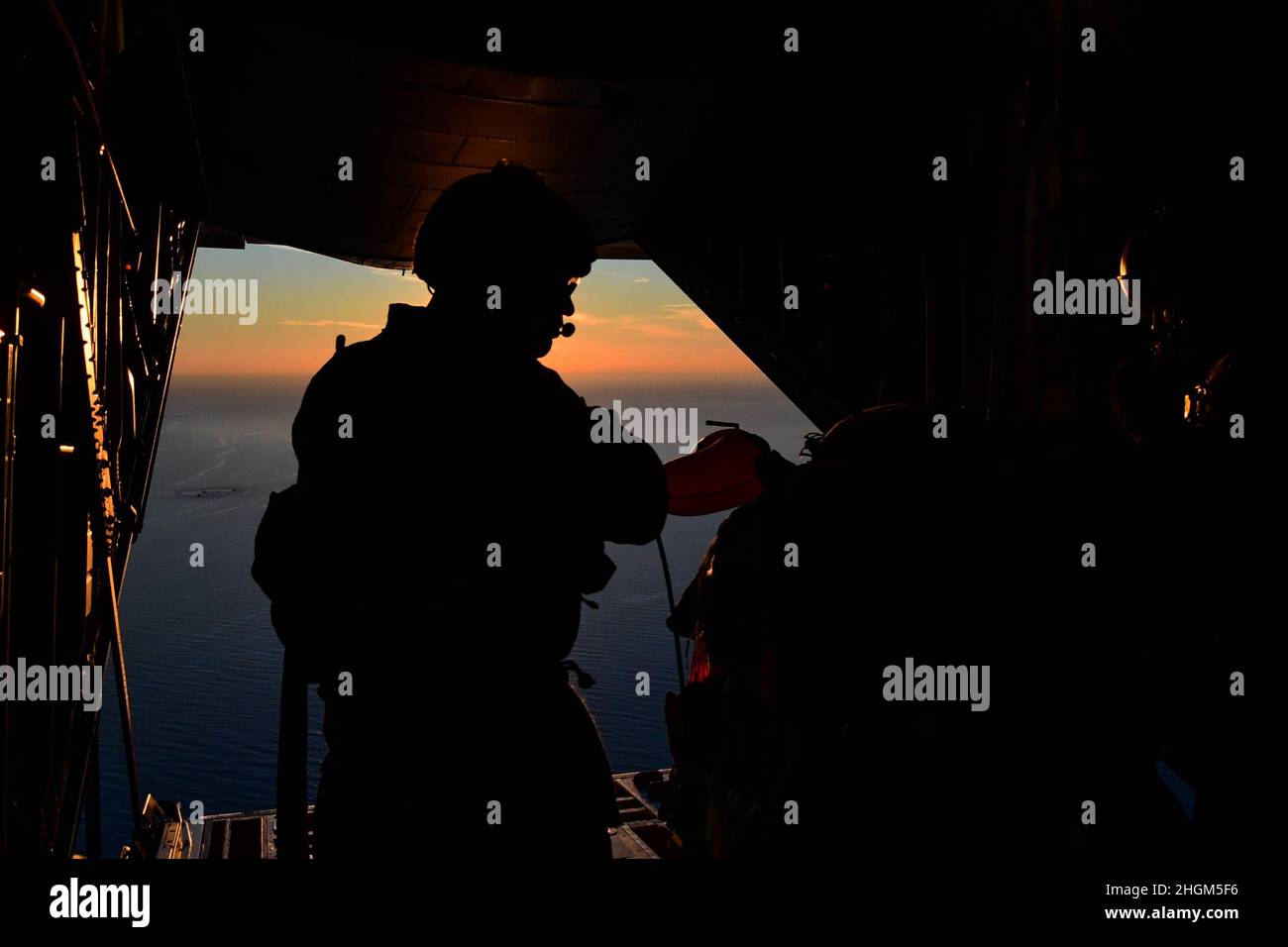Tech. Sgt. Nathan Young, 57th Rescue Squadron jump master, prepares to ...