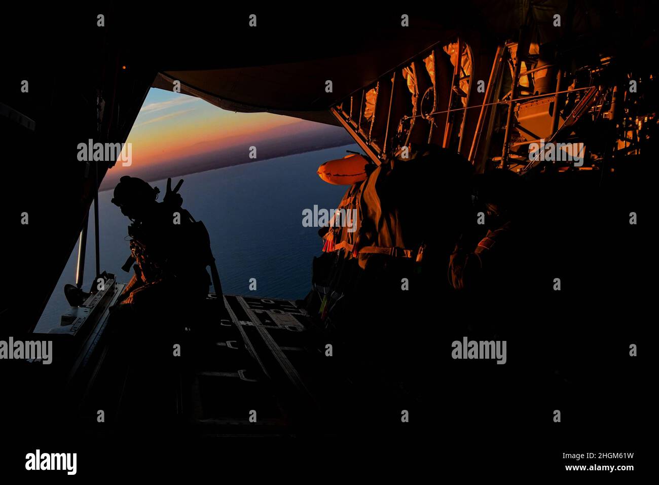 Tech. Sgt. Nathan Young, 57th Rescue Squadron jump master, prepares to ...