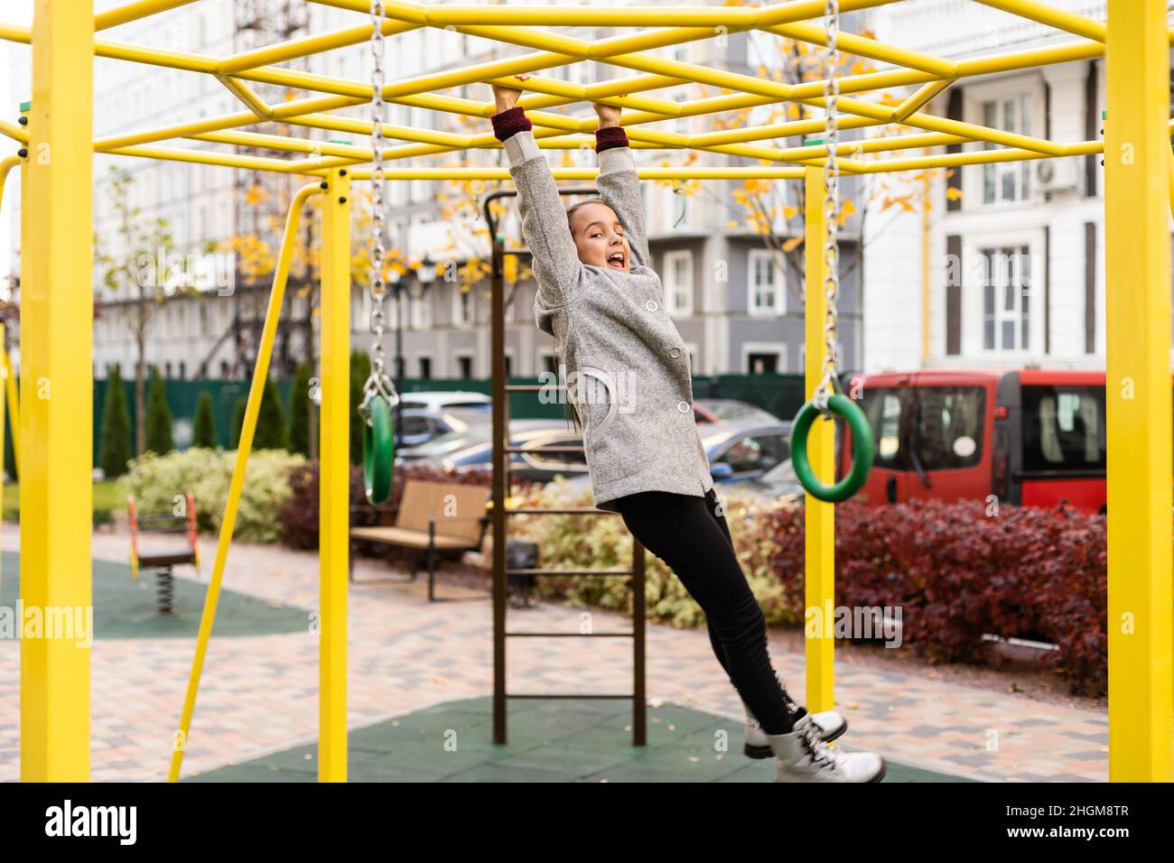 portrait of a little schoolgirl girl at the playground Stock Photo - Alamy