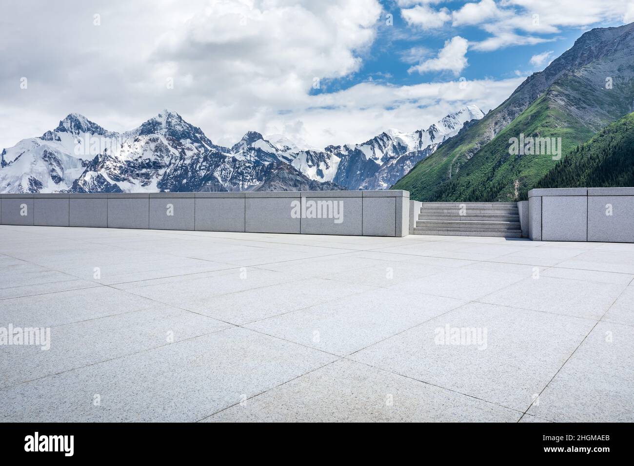 Empty square floor and snow mountain background. Stock Photo