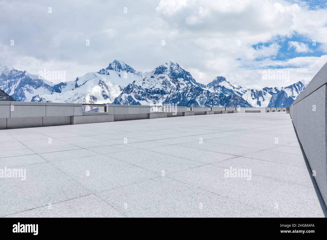 Empty square floor and snow mountain background. Stock Photo