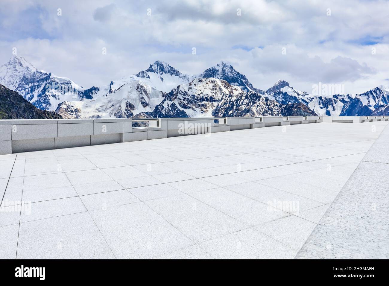 Empty square floor and snow mountain background. Stock Photo