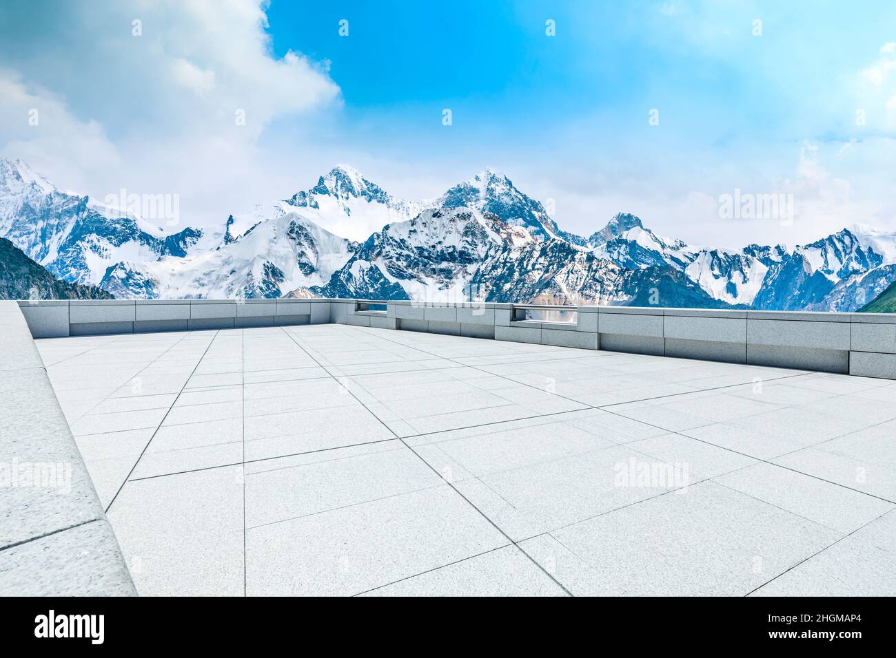 Empty square floor and snow mountain background. Stock Photo