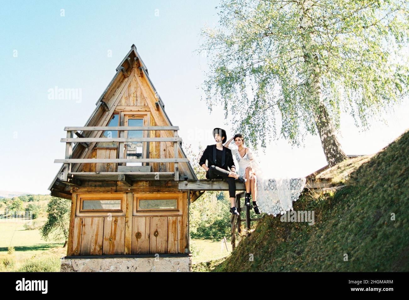 Bride groom sitting on wide hi-res stock photography and images - Alamy