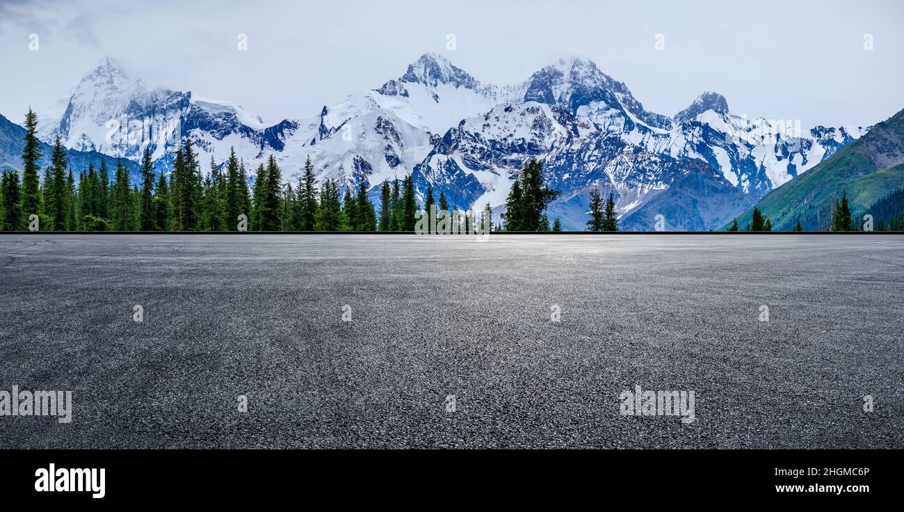 Empty road and snow mountain nature background Stock Photo