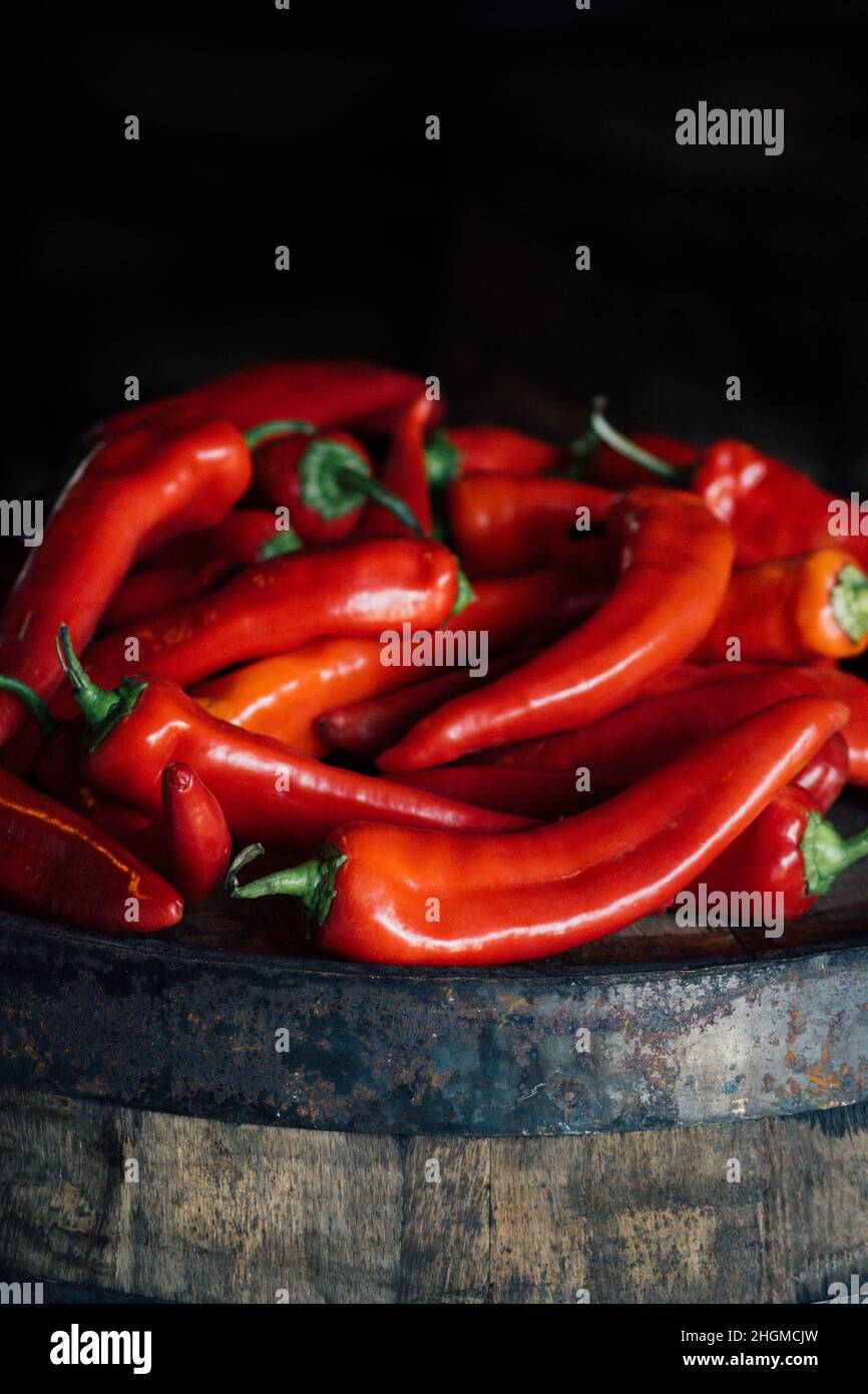 many red Hungarian goat horn chili peppers in a pile Stock Photo - Alamy