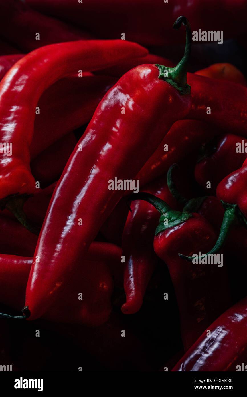 many red Hungarian goat horn chili peppers in a pile Stock Photo - Alamy