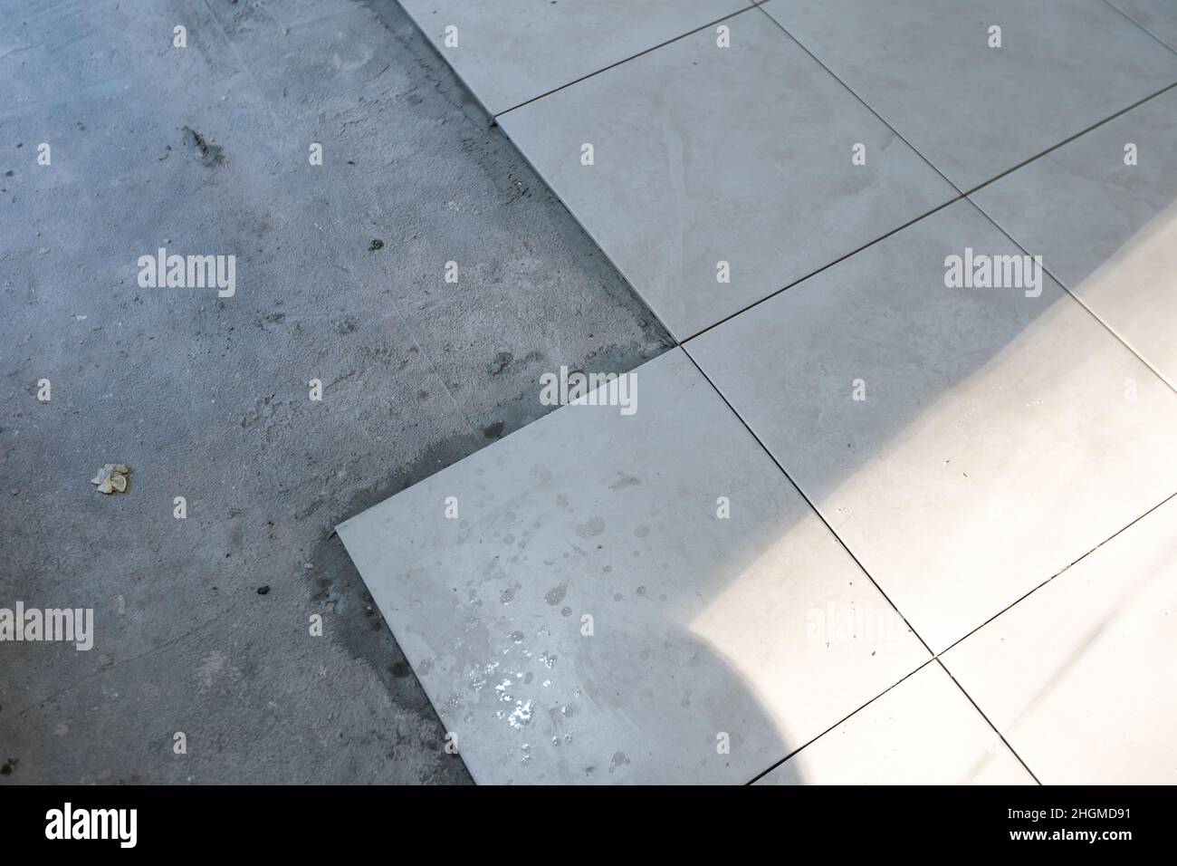 Construction worker putting cement in hi-res stock photography and ...