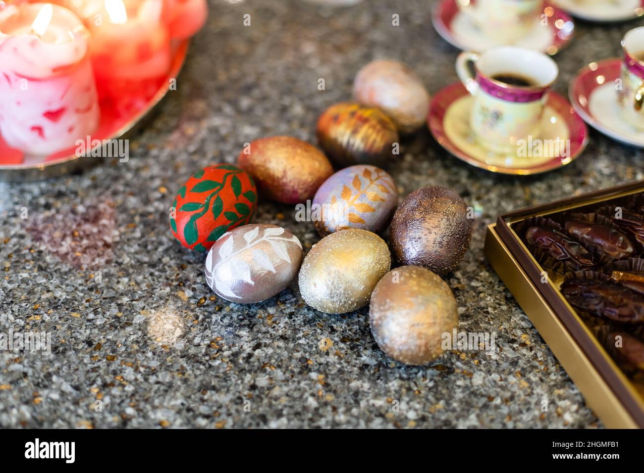 Painted Easter eggs, multicolored, vintage, on a wood table Stock Photo