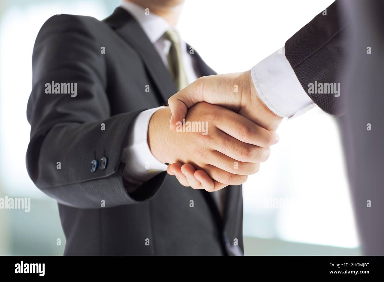 business concept - businessman shaking hands Stock Photo