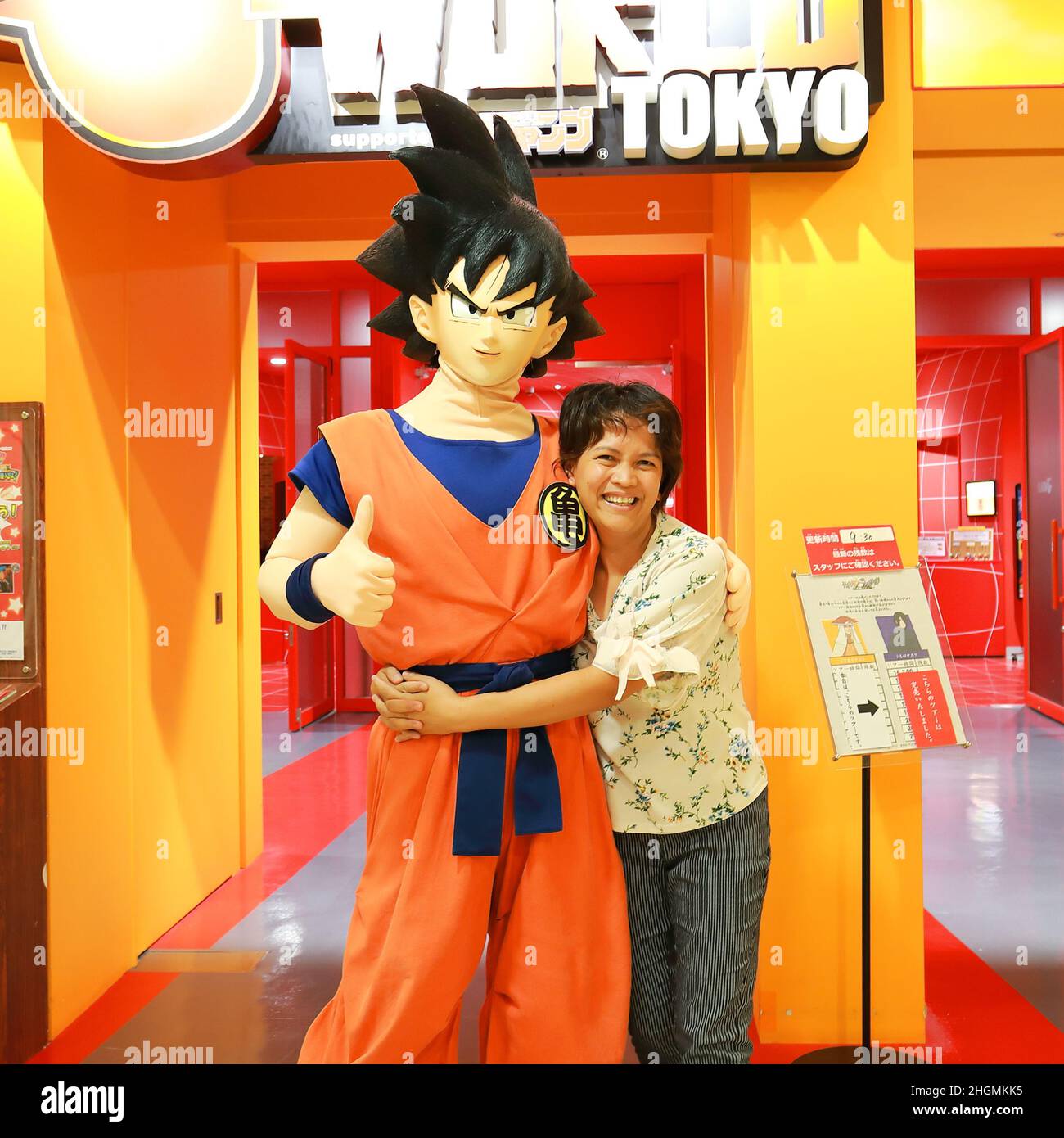Foreigner taking Picture wuth Son Goku at Ikebukuro Sunshine City Stock Photo