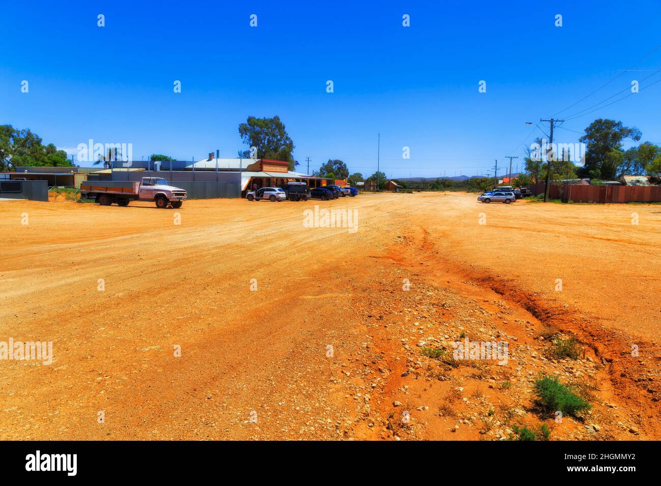 Wide unsealed gravel red soil road of a local street in Silverton ghost