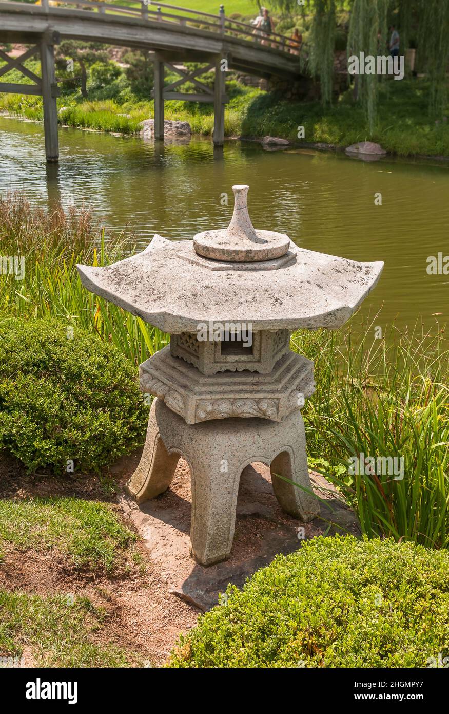 Japanese style stone lantern in the Japanese Island of the Chicago Botanic garden, Glencoe, USA Stock Photo