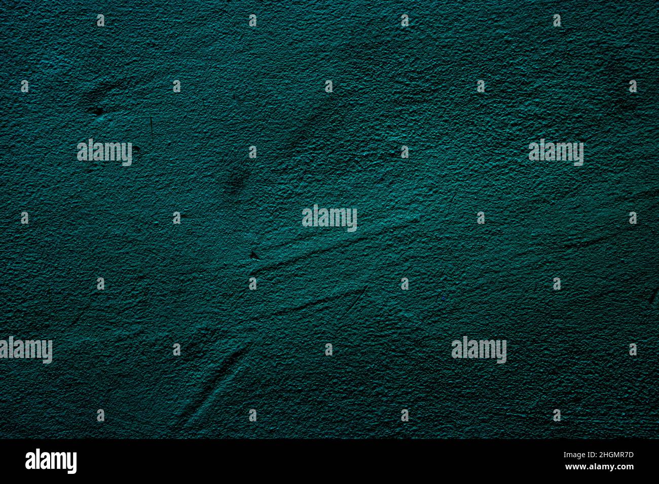 Petrol colored wall background with textures of different shades of ...