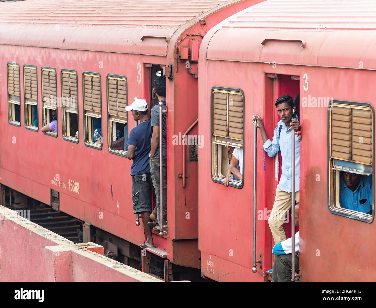 3rd class carriages of train at Kollupitiya Railway Station in Colombo, Sri Lanka. The station is one of the busiest railway stations on the Coastal r Stock Photo