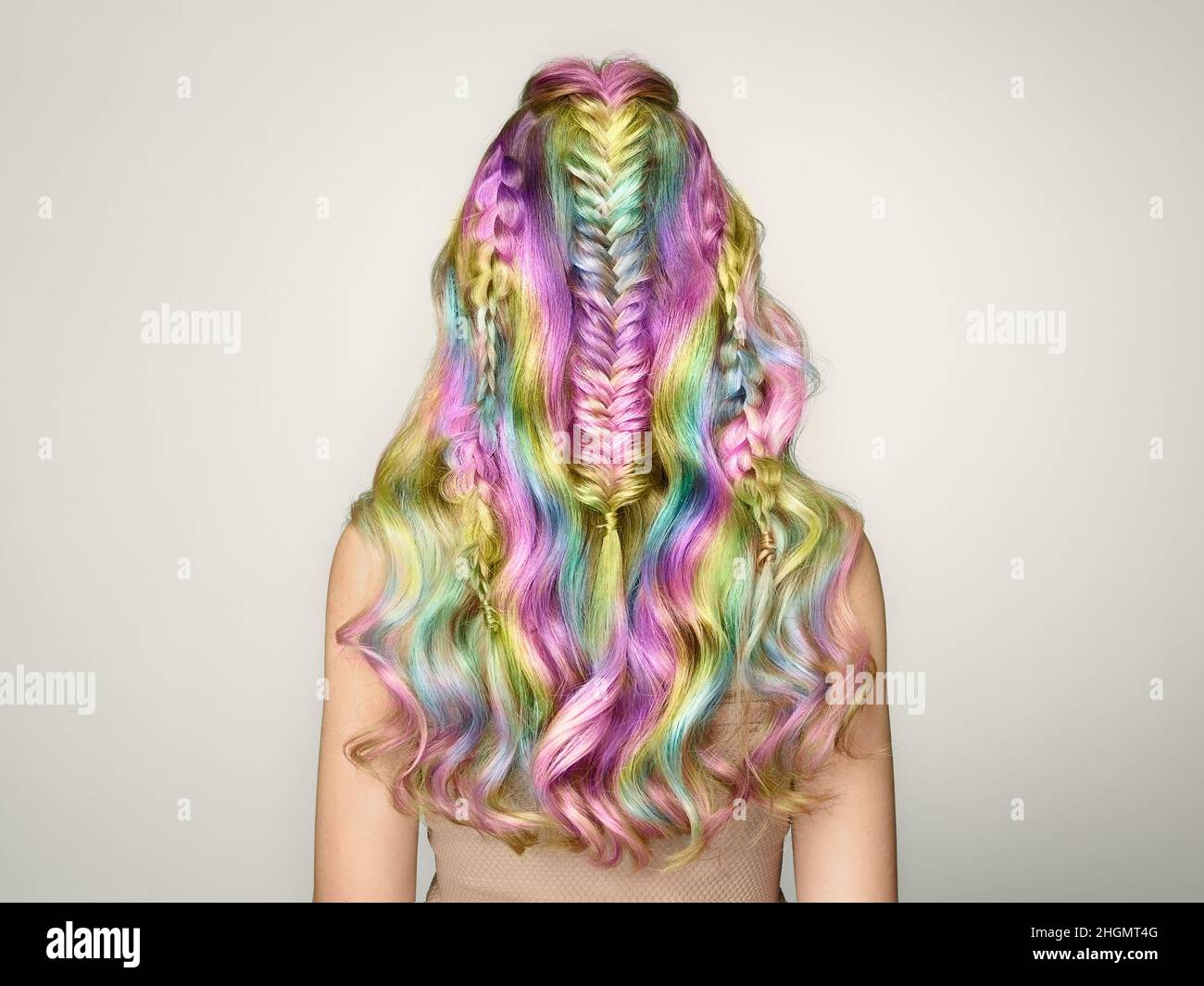Beauty Fashion Model Girl with Colorful Dyed Hair. Girl with perfect  Hairstyle. Model with perfect Healthy Dyed Hair. Rainbow Hairstyles Stock Photo