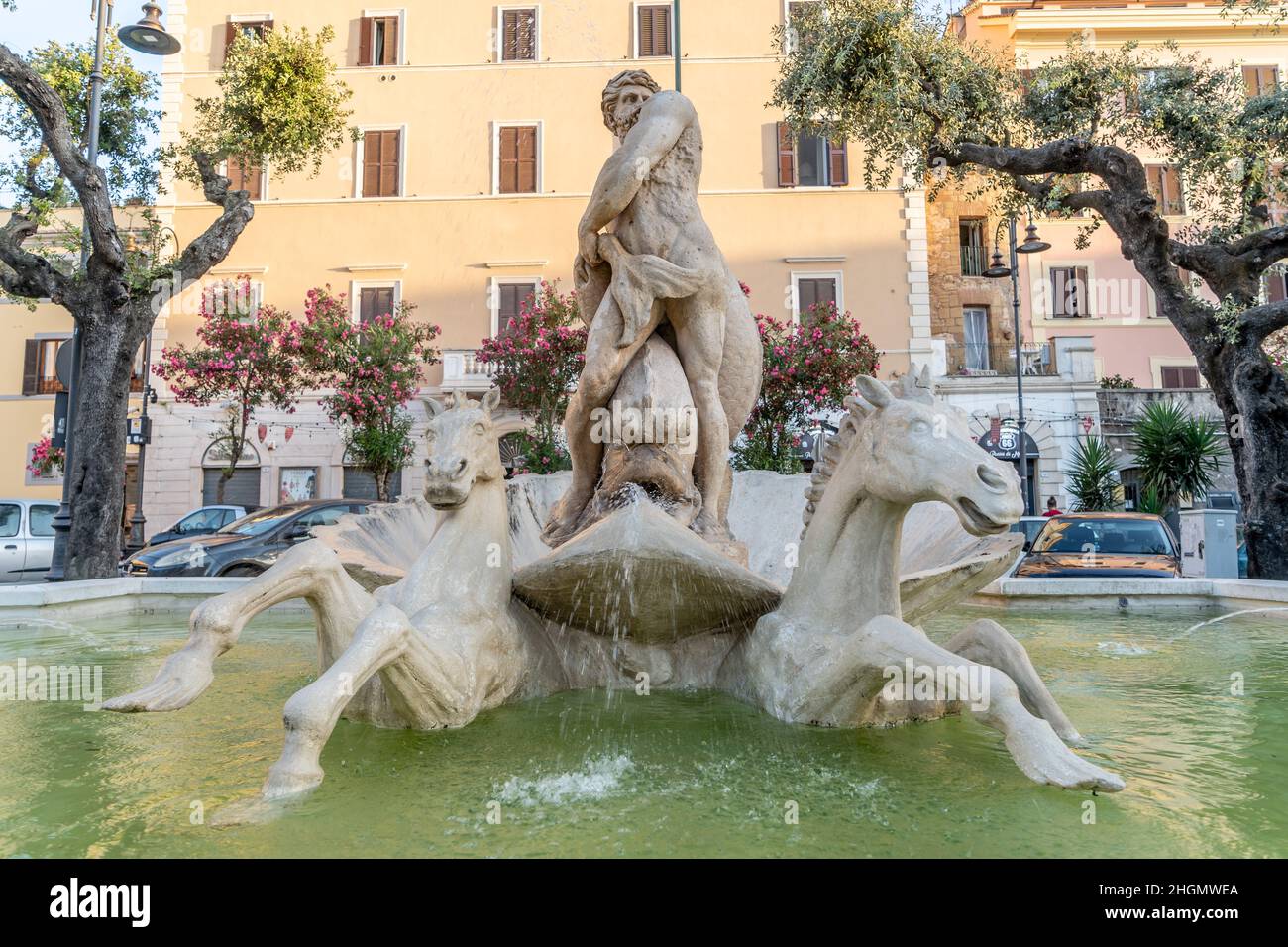Nettuno, Rome, Italy, August 2021: The Fountain of Neptune, symbol of the city that bears the name of the pagan god of the sea, is located in Nettuno, in Piazza Mazzini,old town of Neptune Stock Photo