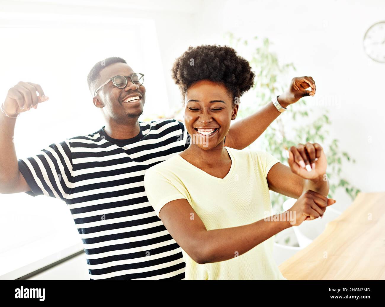 woman couple man happy happiness love black young lifestyle together romantic boyfriend girlfriend dancing dance music Stock Photo