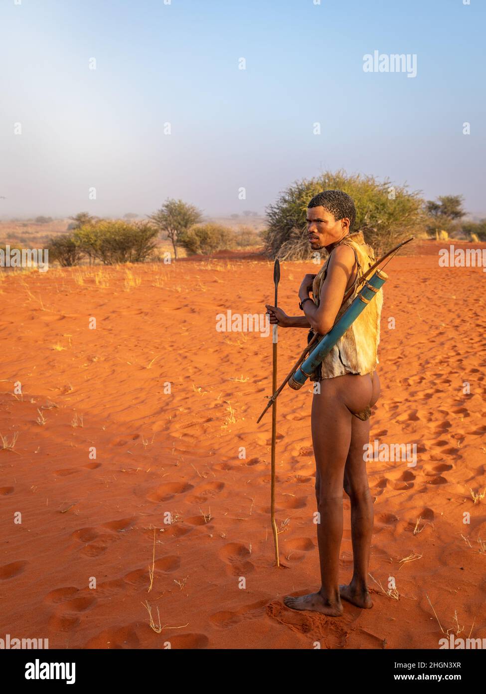 Hardap region, Namibia - 07 09 2018: San bushman with a spear in the morning light. Stock Photo