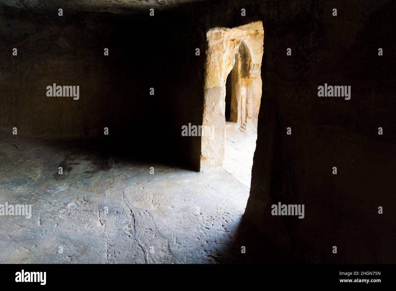 Beautiful light in the living room of a cave of a hermitage in India Stock Photo