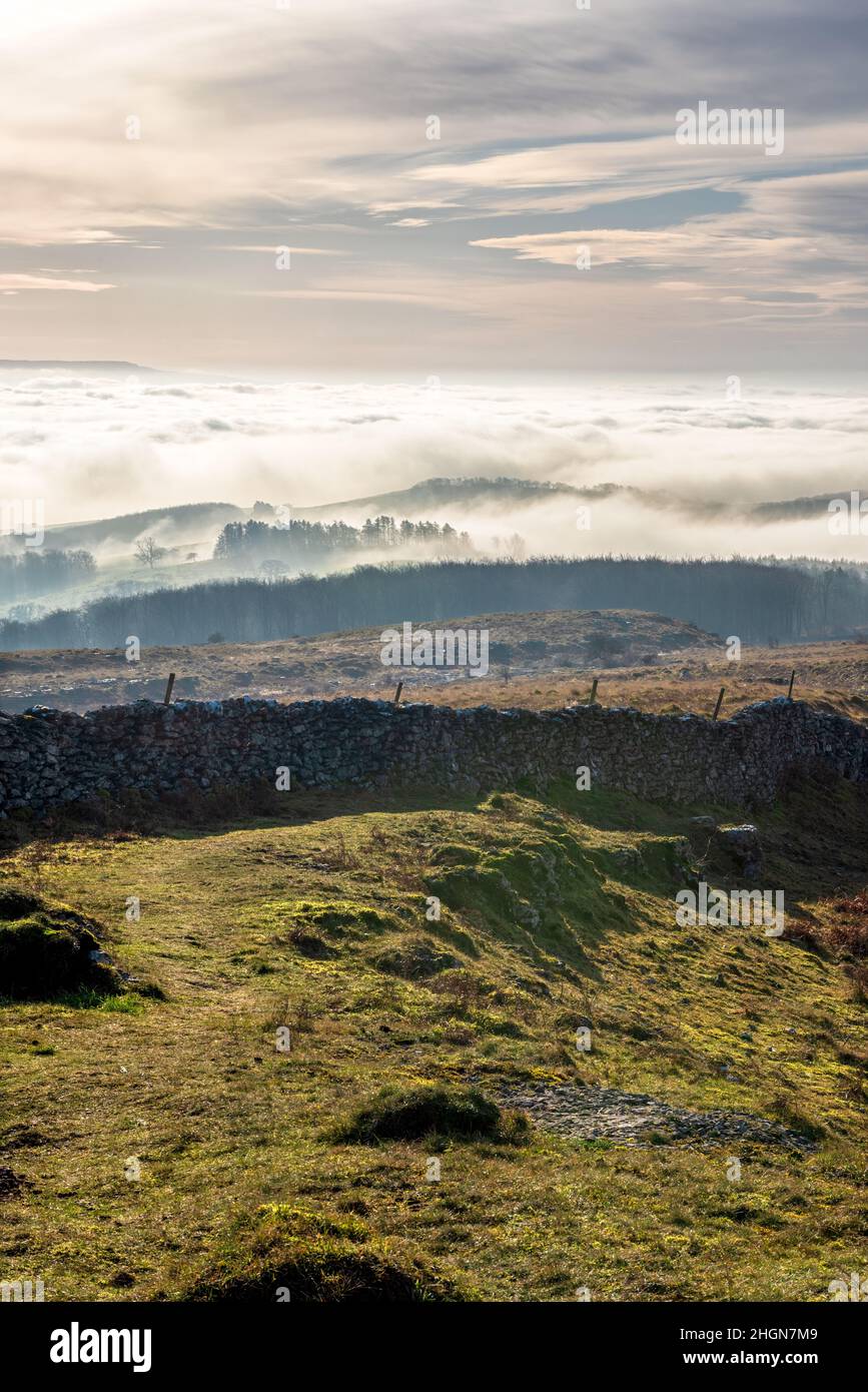 Footpath to Hutton Roof Crags with a Temperature Inversion one the Lune valley in the Background Stock Photo
