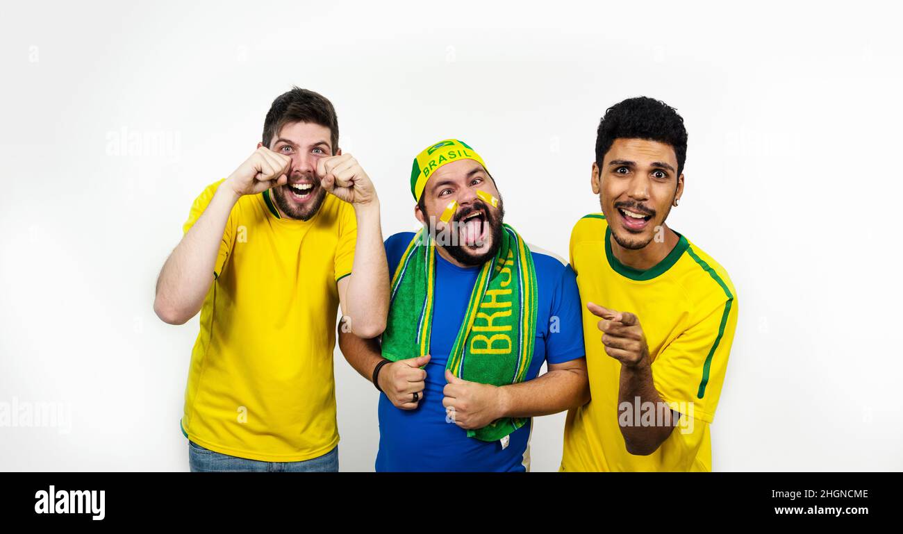 Group of soccer friends making  joke isolated white Stock Photo