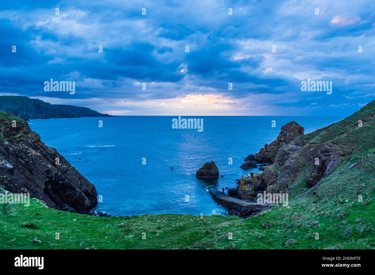 The scenic bay of Pettico Wick (the rock) is hard to access, part of St Abbs Head nature reserve in Berwickshire, Scotland Stock Photo