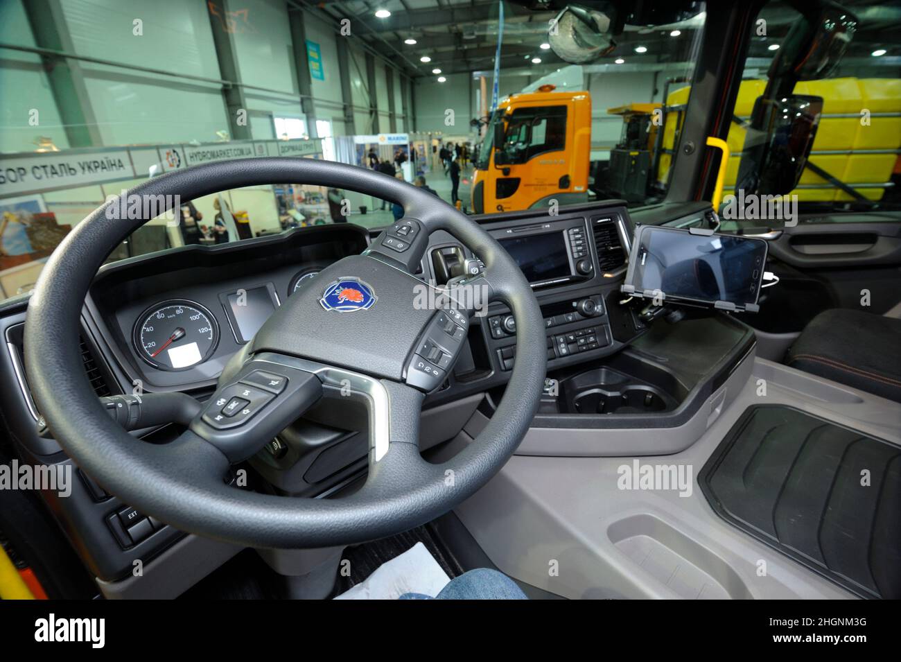 Interior of a new model of a dump truck Scania cabin: seat, wheel, dashboard. Exhibition Heavy Duty 2019. March 20, 2019. Berezovka, Ukraine Stock Photo