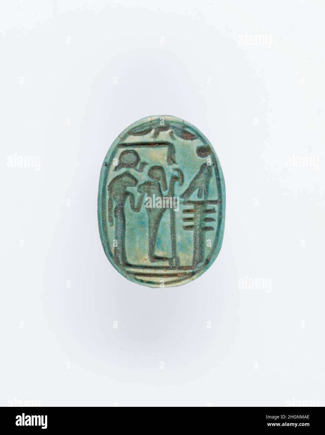 Scarab With an Image of the Gods Ptah and Sakhmet ca. 1295–1186 B.C. New Kingdom, Ramesside The scarab was shaped like a dung beetle, 'scarabaeus sacer,' which is also the source of its modern name. The dung beetle was 'kheperer' in ancient Egyptian. Having watched the small creatures push huge balls of dung, the ancient Egyptians compared the sun being pushed into the sky at dawn to the beetle, and they referred to the rising sun as 'Kheperi.' The word for 'to become' or 'come into being' was 'kheper,' and the beetle hieroglyph was used to spell all of these words. As such, the scarab became Stock Photo